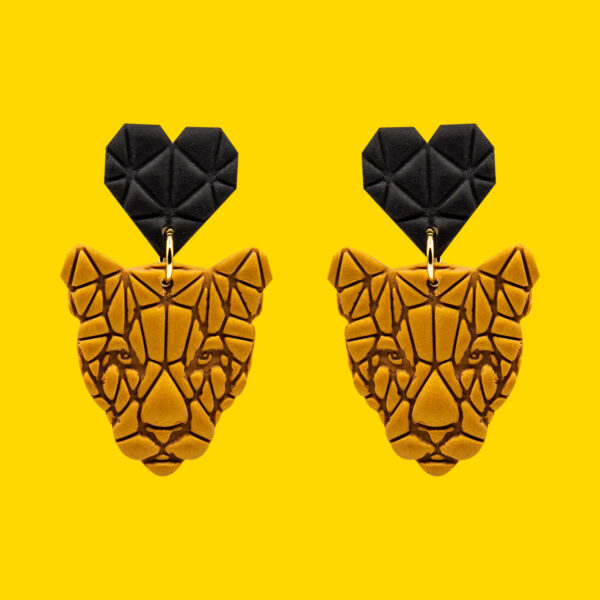 leona geometrica dorada conrazon negro pin